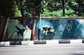 Political propaganda at walls of old US emabassy. Tehran. Iran.