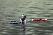 The salt is retrieving from the lake without any mechanization. Salt Lake, El Sod. Ethiopia.