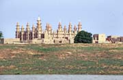 Muddy mosque built at sahel architecture style. Small village near Mopti. Mali.