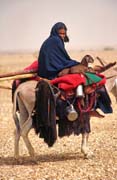 Tuaregs on the way to reach new place for living. Sahara desert. Mali.