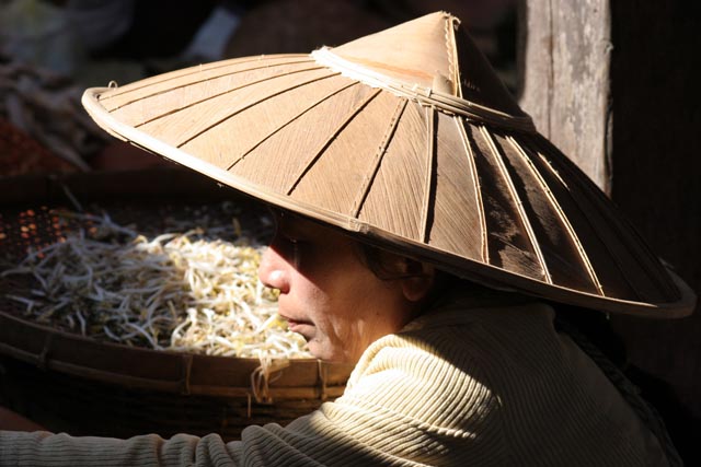 Woman from Intha tribe at Inle Lake market. Myanmar (Burma).