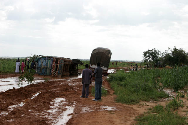 Traffic accidents are relatively common. Small unsealed part of roud from Niamey to Agadez is blocked by crashed truck. Niger.