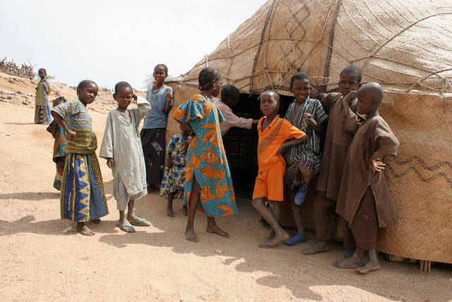 Wondering children in front of young marrieds house. Air Mountain area. Niger.