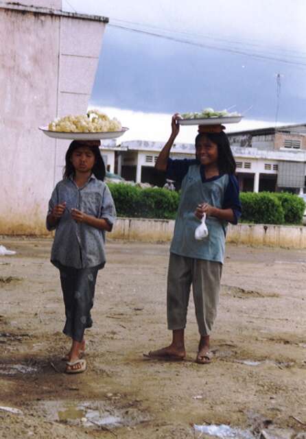 Street vendors at Kompong Chhnang town. Cambodia.
