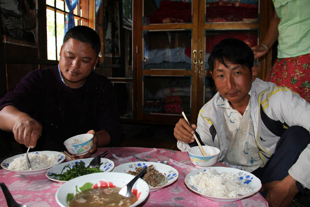 Lahu family during their Lahu New Year celebration, area around Kengtung town. Myanmar (Burma).